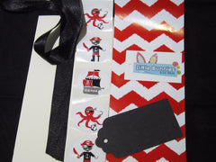 Black satin ribbon, pirate decal, black gift tag and red belly band wrap